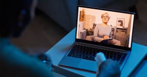 A virtual counseling session on a laptop