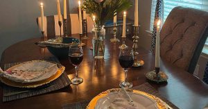 A table set for a candlelit dinner date.