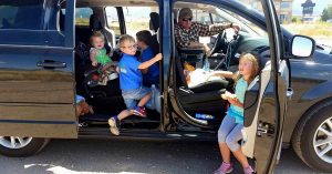 Lizann’s family traveling in their van. 
