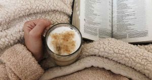 MilSpouse Sydney reading and drinking coffee