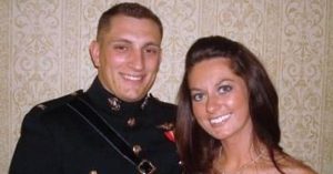 Kristi and her husband smiling at the Military Ball