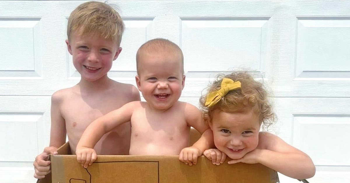 Sydney's children in a moving box