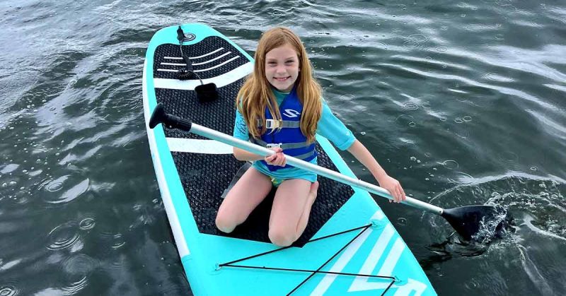 Young girl in kayak