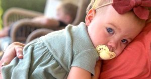 Baby being held