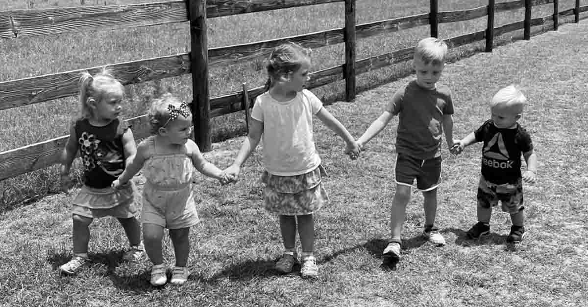 Sydney’s children holding hands