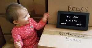 Lizann’s daughter as a baby in a moving box