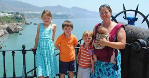Lizann’s family in front of the ocean