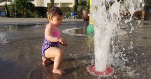 Lizann’s baby plays in water