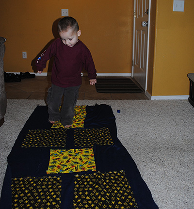 A child playing hopscotch