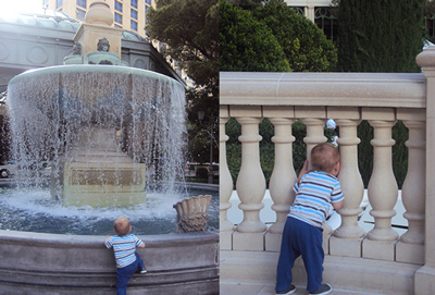A child playing in the fountain 