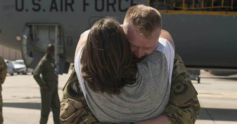 U.S. Air Force Staff Sgt. Jeffrey Sieff, a Boom Operator with the 50th Air Refueling Squadron, embraces his wife Ivy, after returning from a deployment, MacDill Air Force Base, Fla., June 22, 2019.
