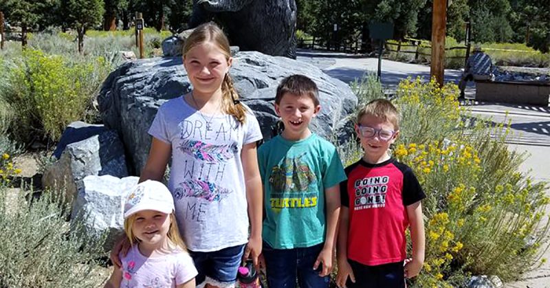 Four children posing at Big Bear lake