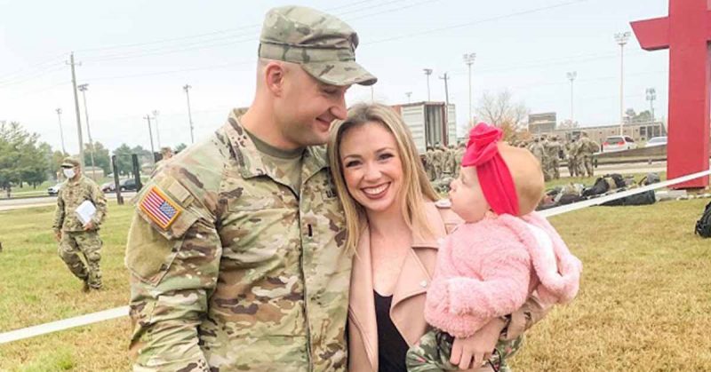 A Military family posing for a photo