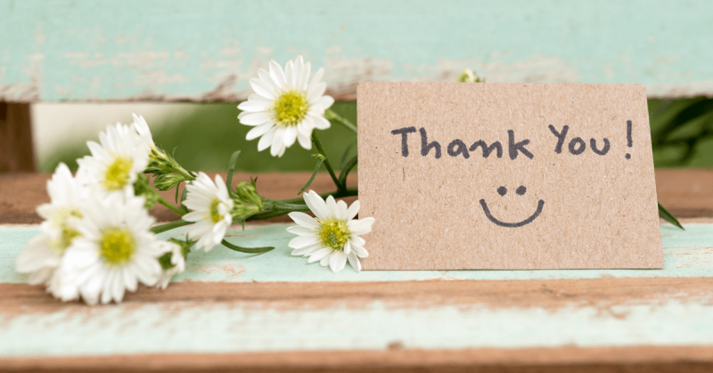 thank you note next to flowers
